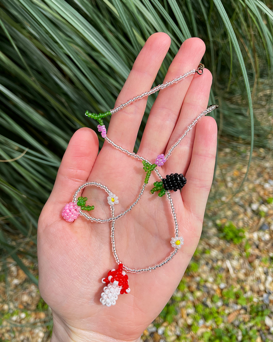 Mushroom beaded necklace with berries and daisy flowers