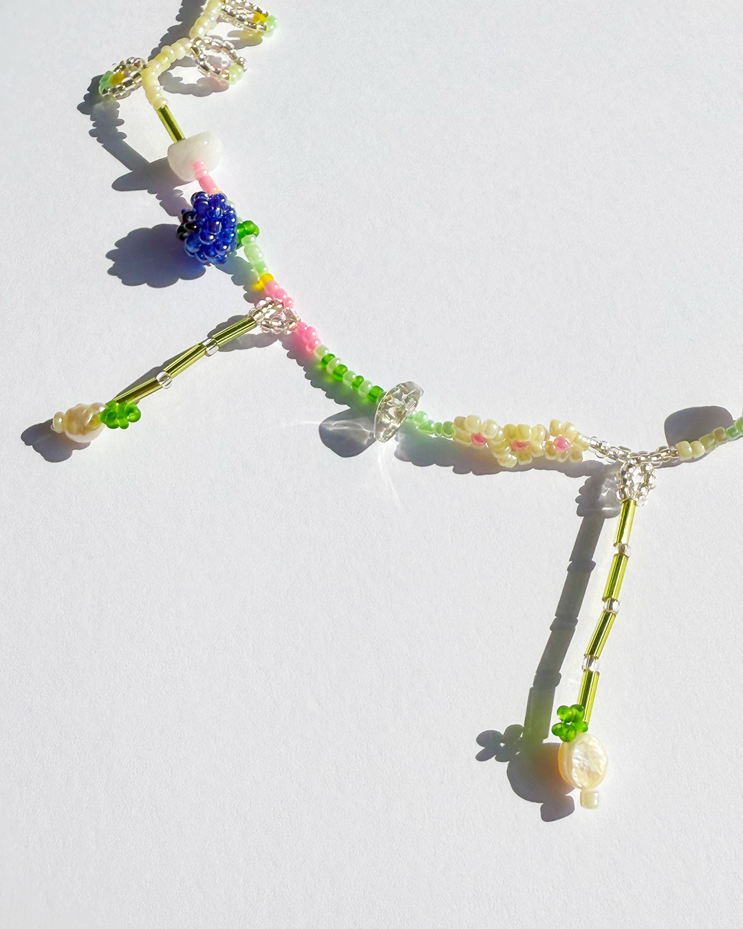 Blueberry and raspberry necklace with quartz and pearls