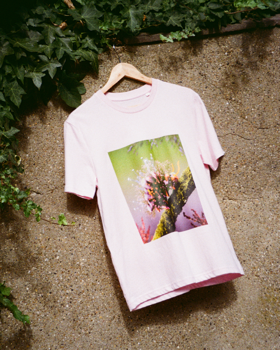 Pink t-shirt with a cute flower caterpillar