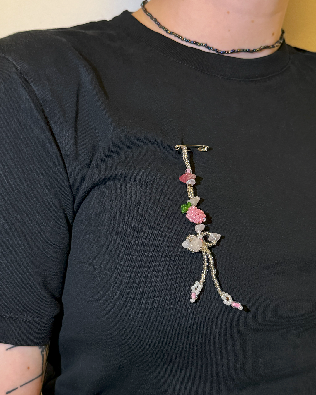 Beaded brooch with flowers and a raspberry