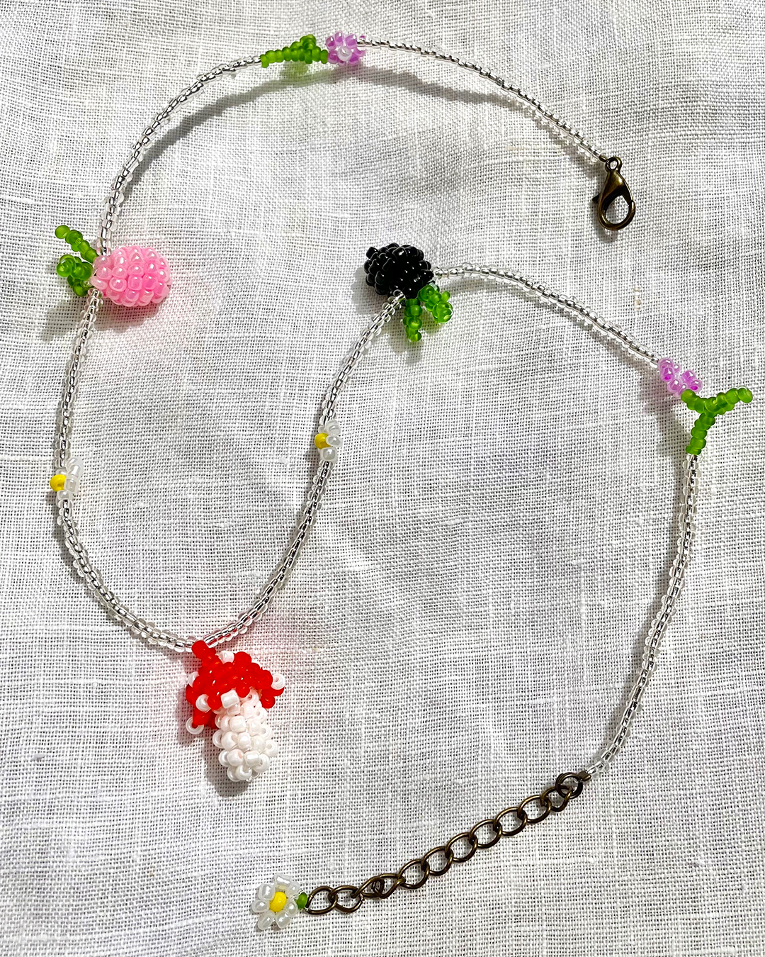 Mushroom beaded necklace with berries and daisy flowers