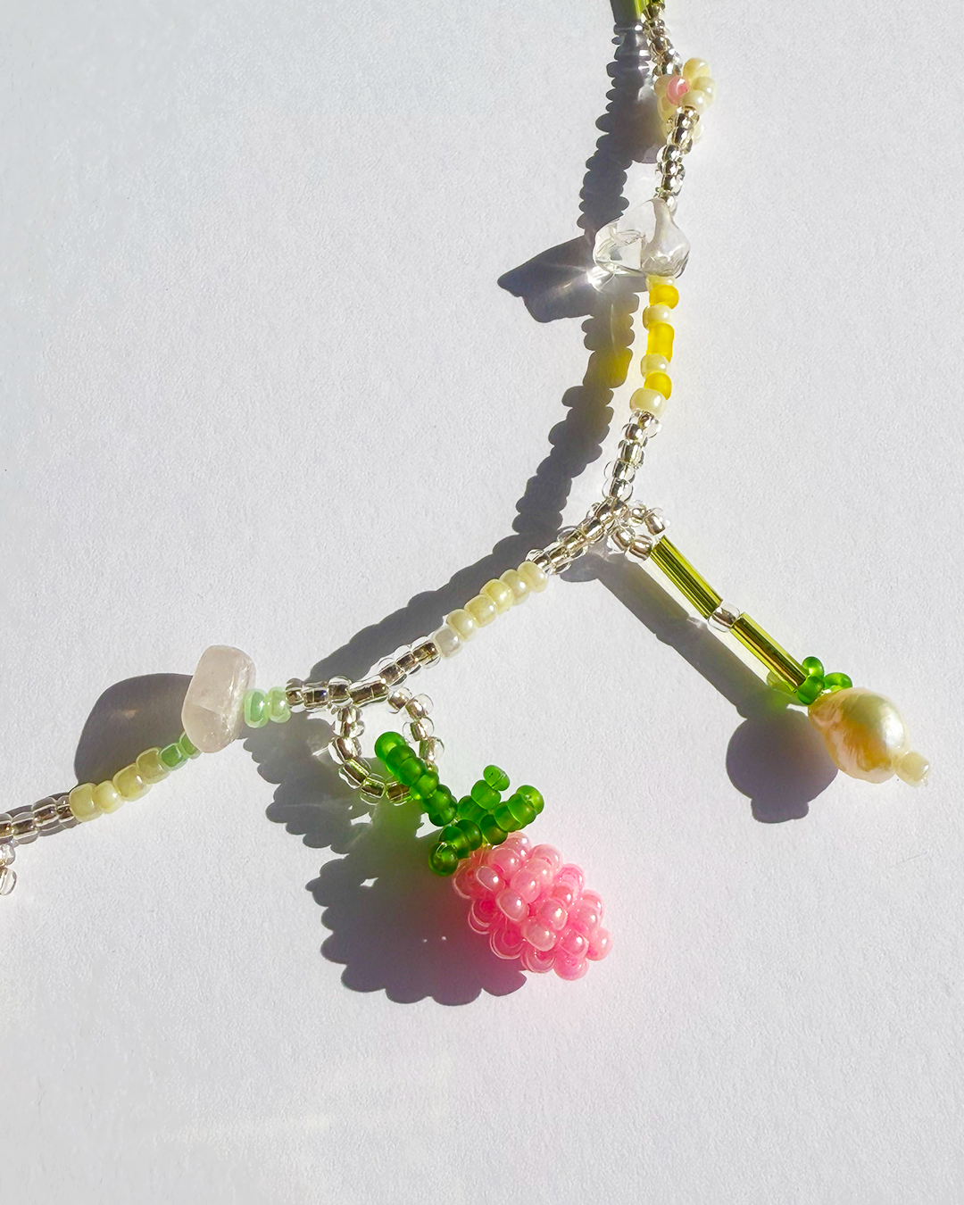 Blueberry and raspberry necklace with quartz and pearls