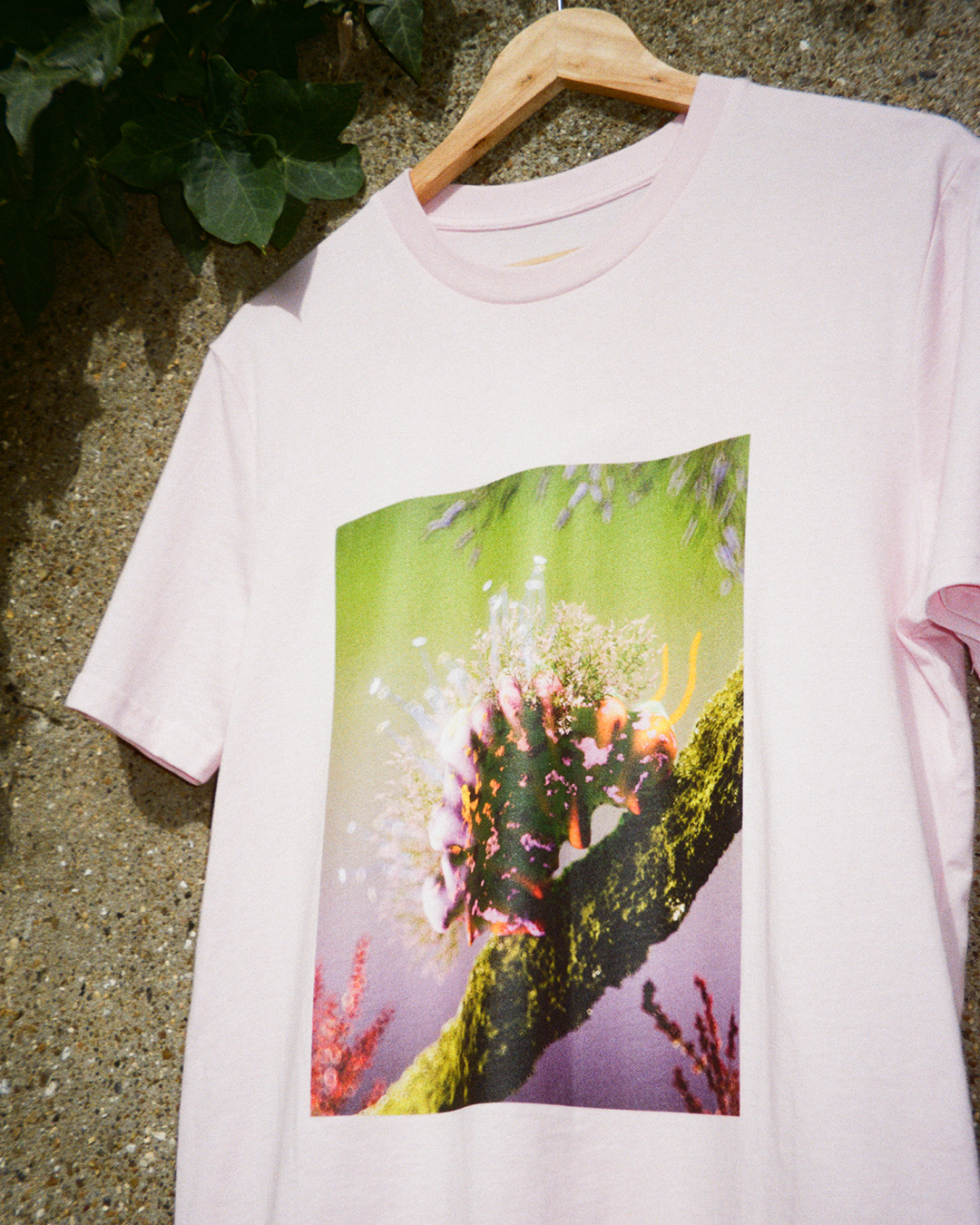 Pink t-shirt with a cute flower caterpillar