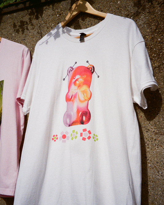White t-shirt with a gummy bear and beaded flowers