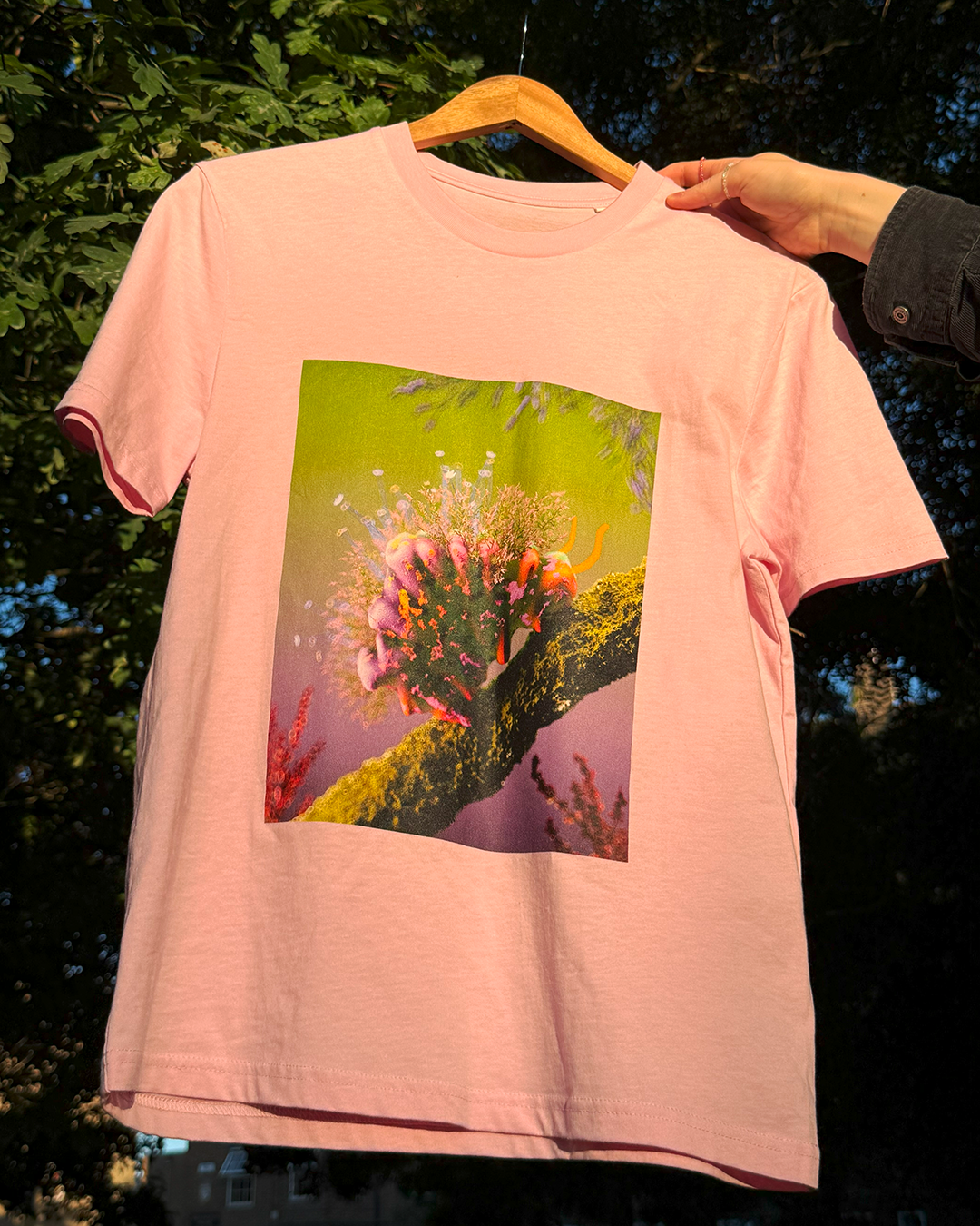 Pink t-shirt with a cute flower caterpillar