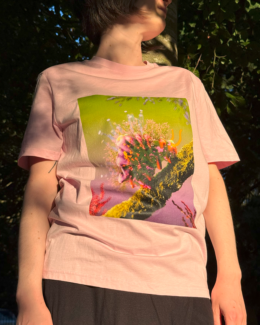 Pink t-shirt with a cute flower caterpillar